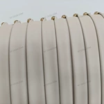 Light Beige Leather Upholstered Bed with Vertical Pleated Headboard & Gold Stainless Steel Ball Studs